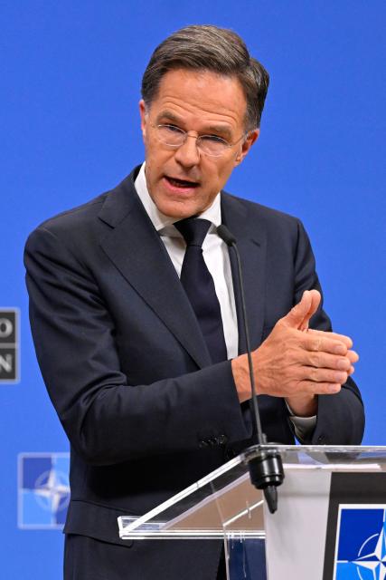 NATO Secretary General Mark Rutte holds a press conference on the sidelines of a NATO Defence Ministers meeting at the NATO headquarters, in Brussels, on June 18, 2026. (Photo by JOHN THYS / AFP)