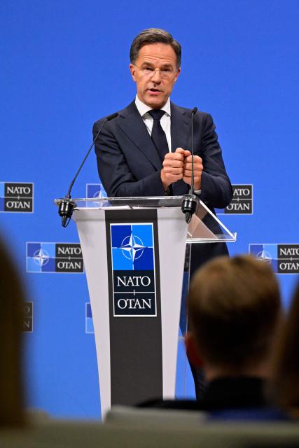 NATO Secretary General Mark Rutte holds a press conference on the sidelines of a NATO Defence Ministers meeting at the NATO headquarters, in Brussels, on June 18, 2026. (Photo by JOHN THYS / AFP)