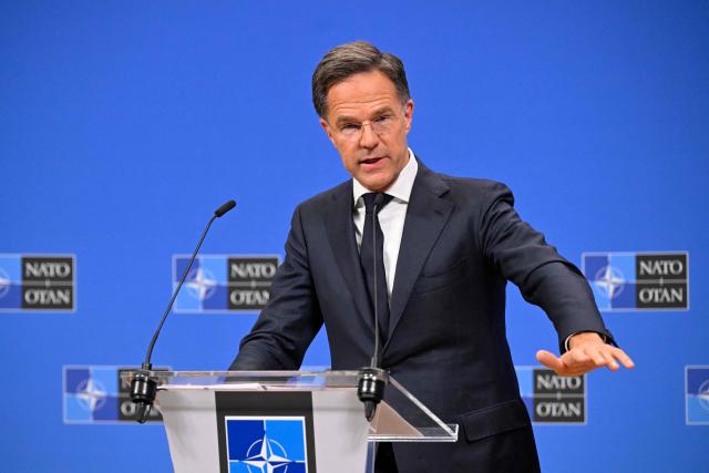 NATO Secretary General Mark Rutte holds a press conference on the sidelines of a NATO Defence Ministers meeting at the NATO headquarters, in Brussels, on June 18, 2026. (Photo by JOHN THYS / AFP)