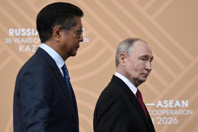 Russia's President Vladimir Putin and Philippine President Ferdinand Marcos Jr. leave after delivering press statements following the Russia-ASEAN summit, which commemorates 35 years of collaboration between Russia and the ASEAN countries, in the central Russian city of Kazan, around 700 kilometres (435 miles) east of the capital Moscow, on June 18, 2026. (Photo by Alexander NEMENOV / POOL / AFP)