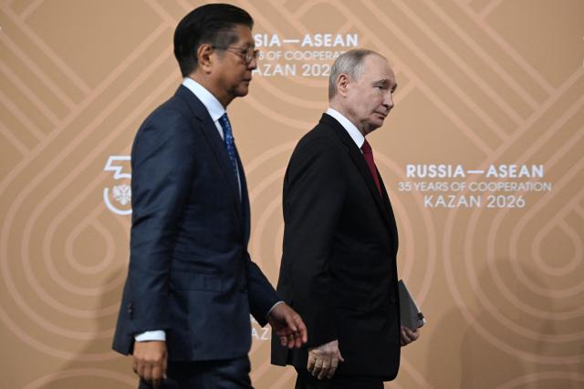 Russia's President Vladimir Putin and Philippine President Ferdinand Marcos Jr. leave after delivering press statements following the Russia-ASEAN summit, which commemorates 35 years of collaboration between Russia and the ASEAN countries, in the central Russian city of Kazan, around 700 kilometres (435 miles) east of the capital Moscow, on June 18, 2026. (Photo by Alexander NEMENOV / POOL / AFP)