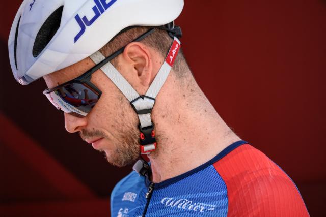 Groupama-FDJ's French rider Remi Cavagna looks on during the team presentation of the second stage of the Men’s Tour of Switzerland (Tour de Suisse) cycling race in Locarno, Switzerland, on June 18, 2026. (Photo by Fabrice COFFRINI / AFP)