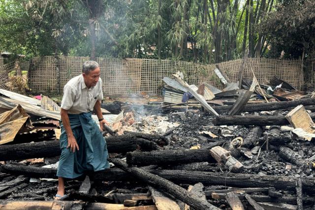 A man clears debris after an airstrike by Myanmar's military in Kyauktaw, western Rakhine State on June 18, 2026. A Myanmar military airstrike has killed seven civilians including a five-year-old child in the country's conflict-ravaged west, a witness and a rescue worker said on June 18. (Photo by AFP)
