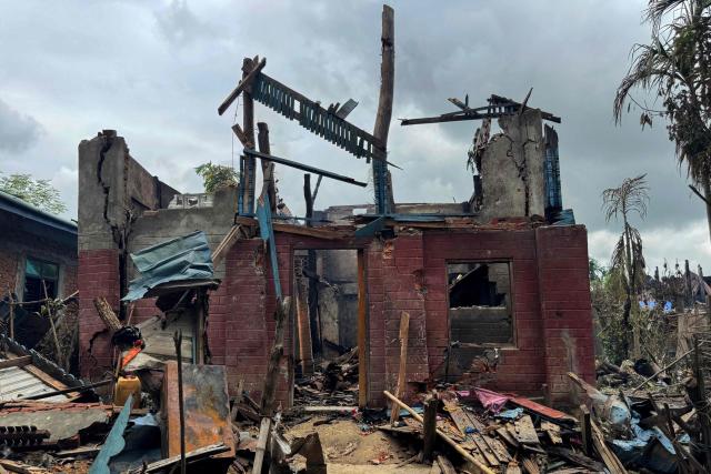 A general view shows the ruins of a building after an airstrike by Myanmar's military in Kyauktaw, western Rakhine State on June 18, 2026. A Myanmar military airstrike has killed seven civilians including a five-year-old child in the country's conflict-ravaged west, a witness and a rescue worker said on June 18. (Photo by AFP)