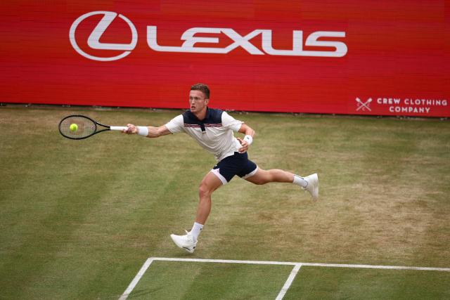 Czech Republic's Jiri Lehecka returns against Australia's Rinky Hijikata during their men's singles round of 16 tennis match on day three of the ATP HSBC Championships at Queen's Club in west London on June 18, 2026. (Photo by Henry Nicholls / AFP)