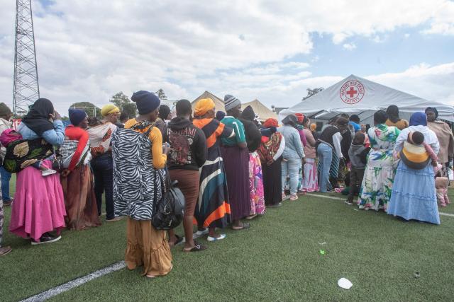 Malawians repatriated from South Africa queue for assistance at a Malawi Red Cross tent at Kamuzu stadium, the countrys receiving camp on June 18, 2026 before being identified and transported to their districts. Thousands of Malawians have crammed into a field in the South African city of Durban in dire conditions, desperate to return home and escape a wave of violence against foreigners.
Frustration and anger are building at the makeshift camp at Sherwood Park, where some have been waiting for days for buses to take them back to Malawi, more than 2,000 kilometres (1,300 miles) away. (Photo by Amos GUMULIRA / AFP)