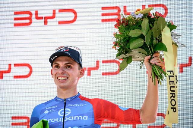 Winner of the stage, Groupama-FDJ's French rider Romain Gregoire celebrates during the podium ceremony of the second stage 157,7km from Locarno to Locarno at the Men’s Tour of Switzerland (Tour de Suisse) cycling race in Locarno, Switzerland, on June 18, 2026. (Photo by Fabrice COFFRINI / AFP)