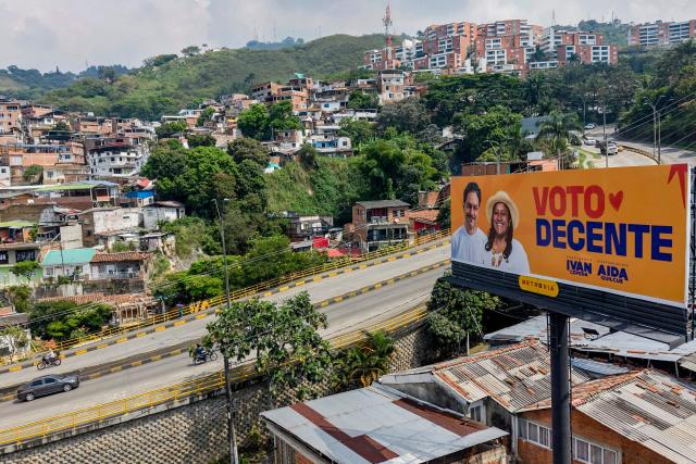 Aerial view of a billboard of presidential canditate Ivan Cepeda, of the Pacto Historico party, for the upcoming presidential election in Cali, Colombia, on June 18, 2026. Colombians vote on June 21, 2026 in a presidential runoff pitting a hard-right opera-singer-turned-lawyer against a leftist senator, an election with stark consequences for the country's stumbling peace process with armed groups and strained ties with Washington. (Photo by JOAQUIN SARMIENTO / AFP)