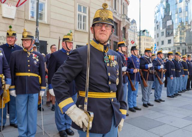 Members of Austrian historical infantry attend the 330th anniversary celebrations of Habsburg traditional military Hoch und Deutschmeister outside of Saint Stephen’s cathedral on June 18, 2026 in Vienna, Austria. The "Hoch- und Deutschmeister" (K.u.K. Infanterie-Regiment Nr. 4) was one of the most prestigious and famous traditional military units of the Habsburg Empire, with origins dating back to 1696. (Photo by Joe Klamar / AFP)