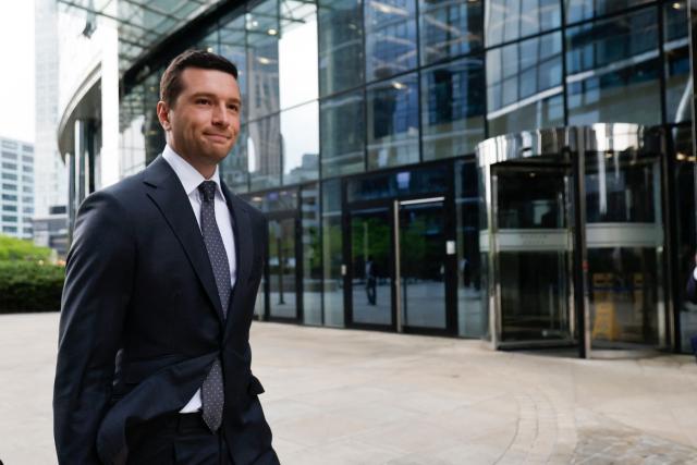 Jordan Bardella, French far-right Rassemblement National (RN) party's President, member of the European Parliament and president of the Patriots for Europe (PfE) group walks in front of the Frontex, the European Border and Coast Guard Agency building in Warsaw, Poland on June 18, 2026. Jordan Bardella is in Warsaw to meet with leaders of Polands far right, marking the latest stop on his overseas tour aimed at strengthening his European alliances just a few months before the French presidential election. (Photo by Wojtek RADWANSKI / AFP)