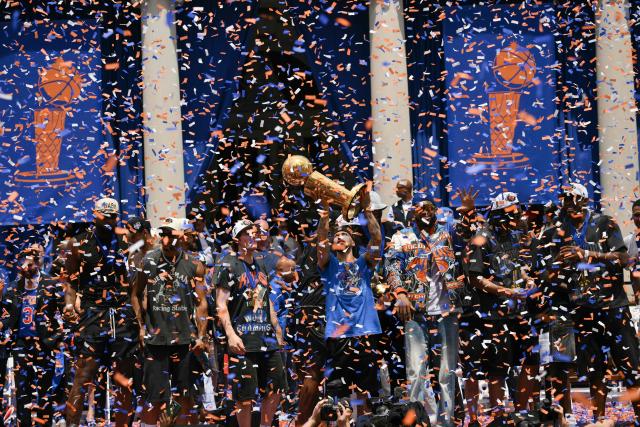 Members of the New York Knicks attend a championship celebration and Key to the City ceremony at City Hall Plaza after a ticker-tape parade honoring the team's NBA Finals victory in New York City on June 18, 2026. (Photo by ANGELA WEISS / AFP)