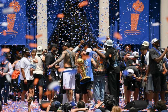 Members of the New York Knicks attend a championship celebration and Key to the City ceremony at City Hall Plaza after a ticker-tape parade honoring the team's NBA Finals victory in New York City on June 18, 2026. (Photo by ANGELA WEISS / AFP)
