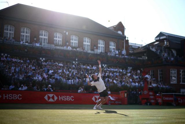 Czech Republic's Jiri Lehecka serves against Australia's Rinky Hijikata during their men's singles round of 16 tennis match on day three of the ATP HSBC Championships at Queen's Club in west London on June 18, 2026. (Photo by Henry NICHOLLS / AFP)