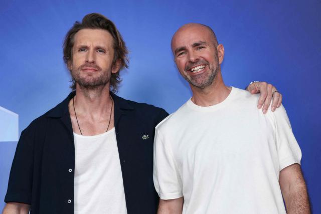 French director and actor Philippe Lacheau (L) and French actor Julien Arruti (R) pose during the TF1 Upfront 2026 photocall in Boulogne-Billancourt, West of Paris, on June 18, 2026. (Photo by Alain JOCARD / AFP)