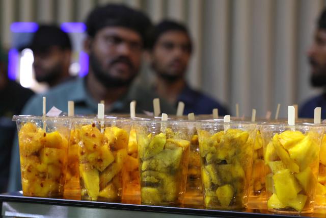 Mangoes are displayed at a stall during the 3rd edition of the Indian Mango Festival (Hamba Exhibition) at Souq Waqif in Doha on June 18, 2026. (Photo by Karim JAAFAR / AFP)