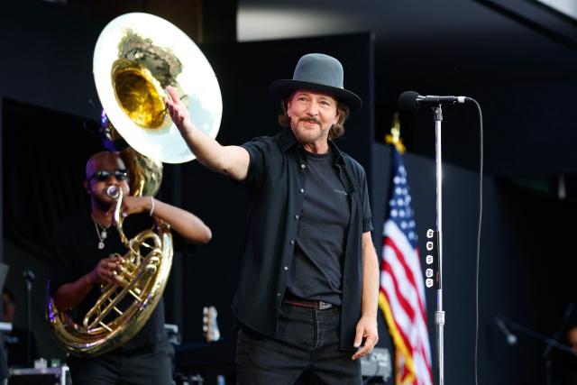 US singer Eddie Vedder performs at the opening of the Barack Obama Presidential Center in Chicago, Illinois, on June 18, 2026. (Photo by Kamil Krzaczynski / AFP)