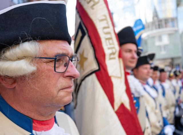 German historical military enthusiasts of Deutchmaster Spielmannnszug from Bad Mergentheim attend the 330th anniversary celebrations of Habsburg traditional military Hoch und Deutschmeister outside of Saint Stephen’s cathedral on June 18, 2026 in Vienna, Austria. The "Hoch- und Deutschmeister" (K.u.K. Infanterie-Regiment Nr. 4) was one of the most prestigious and famous traditional military units of the Habsburg Empire, with origins dating back to 1696. (Photo by Joe Klamar / AFP)