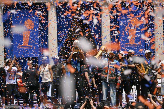 Members of the New York Knicks attend a championship celebration and Key to the City ceremony at City Hall Plaza after a ticker-tape parade honoring the team's NBA Finals victory in New York City on June 18, 2026. (Photo by ANGELA WEISS / AFP)