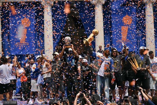 Members of the New York Knicks attend a championship celebration and Key to the City ceremony at City Hall Plaza after a ticker-tape parade honoring the team's NBA Finals victory in New York City on June 18, 2026. (Photo by ANGELA WEISS / AFP)