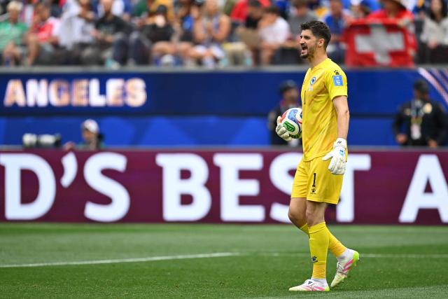 Bosnia-Herzegovina's goalkeeper #01 Nikola Vasilj gestures during the 2026 World Cup Group B football match between Switzerland and Bosnia and Herzegovina at Los Angeles Stadium in Inglewood on June 18, 2026.  (Photo by Patrick T. Fallon / AFP)