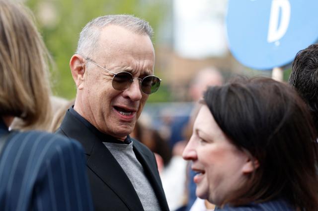 US actor Tom Hanks and producer Elle Key attend opening day of the Barack Obama Presidential Center in Chicago, Illinois, on June 18, 2026. (Photo by Kamil Krzaczynski / AFP)