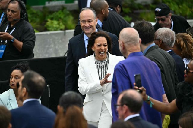 Former US vice president Kamala Harris and her husband Doug Emhoff arrive at the opening day of the Barack Obama Presidential Center in Chicago, Illinois, on June 18, 2026. (Photo by Kent NISHIMURA / AFP)