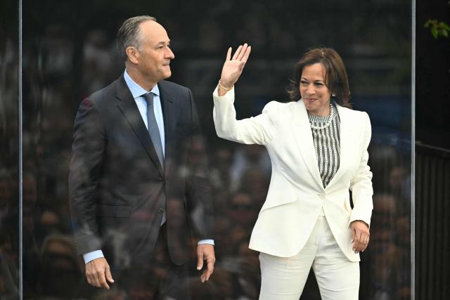 Former US vice president Kamala Harris and her husband Doug Emhoff arrive at the opening day of the Barack Obama Presidential Center in Chicago, Illinois, on June 18, 2026. (Photo by Kent NISHIMURA / AFP)