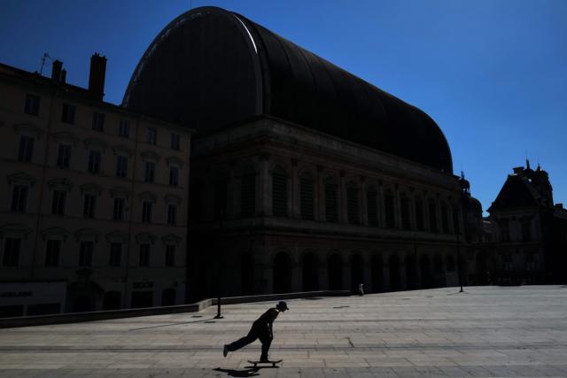 A skateboarder is silhouetted by late afternoon sun during a heatwave in Lyon on June 18, 2026. (Photo by OLIVIER CHASSIGNOLE / AFP)