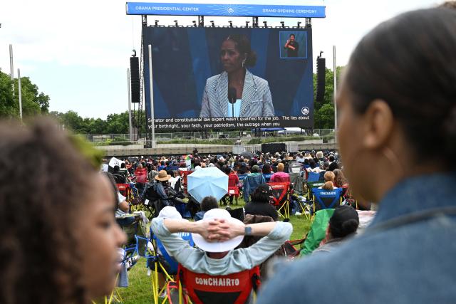 People attend a watch party for the opening of the Barack Obama Presidential Center along the Midway Plaisance in Chicago, Illinois, on June 18, 2026. (Photo by Alex WROBLEWSKI / AFP)