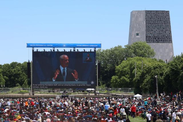 People attend a watch party for the opening of the Barack Obama Presidential Center along the Midway Plaisance in Chicago, Illinois, on June 18, 2026. (Photo by Alex WROBLEWSKI / AFP)