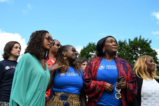 People attend a watch party for the opening of the Barack Obama Presidential Center along the Midway Plaisance in Chicago, Illinois, on June 18, 2026. (Photo by Alex WROBLEWSKI / AFP)