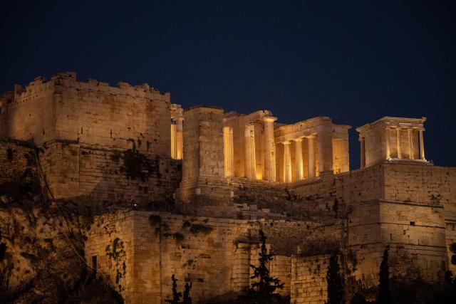 This photograph shows the ancient Acropolis in Athens on June 18, 2026. Greece's culture ministry on June 18, 2026 said it had finished a lengthy restoration, after 220 years, of the western facade of the Parthenon in Athens, re-creating the world-famous monument's early 1800s look. The 2,500-year-old temple honouring the goddess Athena, which sits on a hill overlooking the Greek capital, is visited by more than four million people each year. (Photo by Angelos TZORTZINIS / AFP)