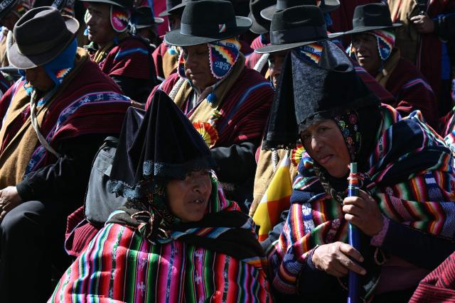 Indigenous people attend a meeting of "Ponchos Rojos" leaders to discuss the future of protests ongoing for more than six weeks in Tilata, La Paz department, Bolivia, on June 18, 2026. For weeks, protesters demanding that US-backed conservative President Rodrigo Paz’s fledgling government address a deep economic crisis, while others called for his resignation, have marched and set up roadblocks, bringing Bolivia to a near standstill, driving up food and fuel prices and causing shortages of basic goods. (Photo by AIZAR RALDES / AFP)