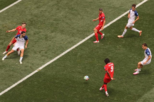 Switzerland's midfielder #09 Johan Manzambi scores his team's third goal during the 2026 World Cup Group B football match between Switzerland and Bosnia and Herzegovina at Los Angeles Stadium in Inglewood on June 18, 2026.  (Photo by Etienne Laurent / AFP)
