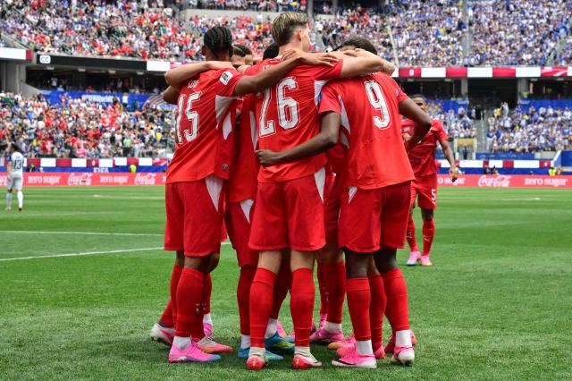 Switzerland's midfielder #09 Johan Manzambi celebrates scoring his team's third goal with teammates during the 2026 World Cup Group B football match between Switzerland and Bosnia and Herzegovina at Los Angeles Stadium in Inglewood on June 18, 2026.  (Photo by Frederic J. Brown / AFP)
