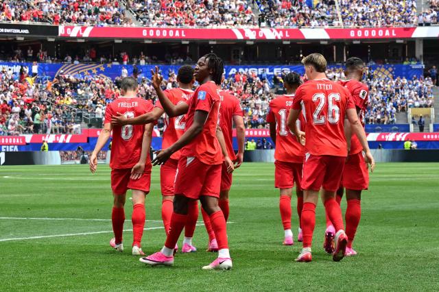 Switzerland's midfielder #09 Johan Manzambi celebrates scoring his team's third goal during the 2026 World Cup Group B football match between Switzerland and Bosnia and Herzegovina at Los Angeles Stadium in Inglewood on June 18, 2026.  (Photo by Frederic J. Brown / AFP)