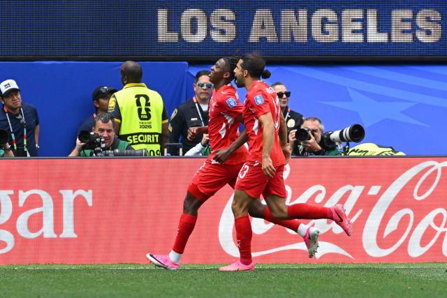 Switzerland's midfielder #09 Johan Manzambi celebrates scoring his team's third goal during the 2026 World Cup Group B football match between Switzerland and Bosnia and Herzegovina at Los Angeles Stadium in Inglewood on June 18, 2026.  (Photo by Patrick T. Fallon / AFP)