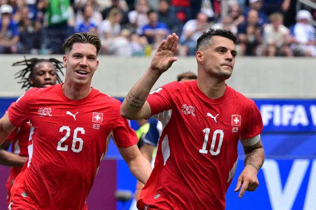 Switzerland's midfielder #10 Granit Xhaka celebrates scoring his team's fourth goal during the 2026 World Cup Group B football match between Switzerland and Bosnia and Herzegovina at Los Angeles Stadium in Inglewood on June 18, 2026.  (Photo by Frederic J. Brown / AFP)