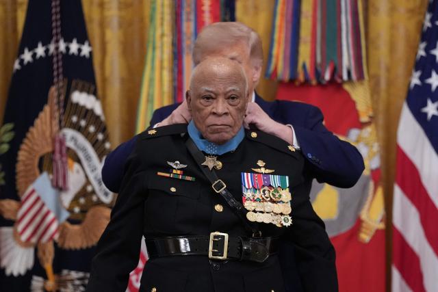 US President Donald Trump bestows the Medal of Honor to US Marine Major James Capers Jr. in the East Room of the White House in Washington, DC on June 18, 2026. (Photo by Ken Cedeno / AFP)