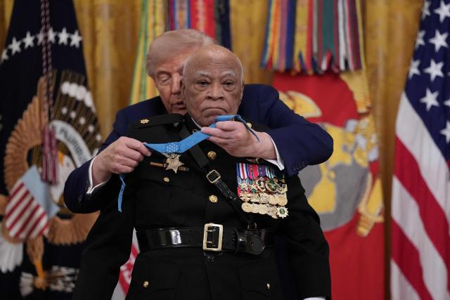 US President Donald Trump bestows the Medal of Honor to US Marine Major James Capers Jr. in the East Room of the White House in Washington, DC on June 18, 2026. (Photo by Ken Cedeno / AFP)