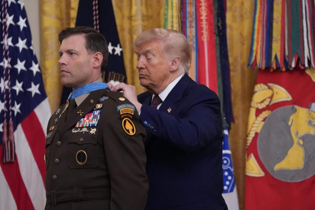 US President Donald Trump bestows the Medal of Honor to retired US Army Major Nicholas Dockery in the East Room of the White House in Washington, DC on June 18, 2026. (Photo by Ken Cedeno / AFP)