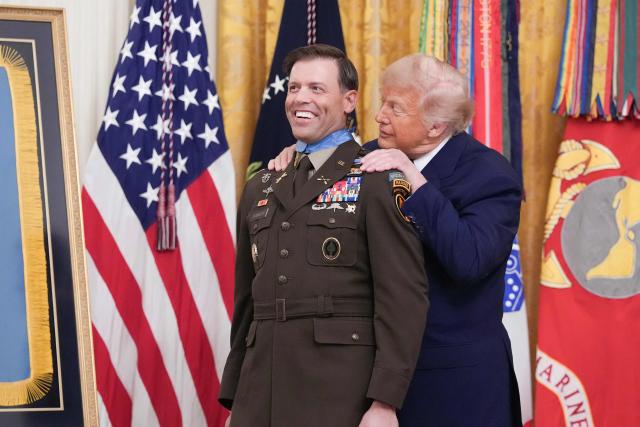 US President Donald Trump bestows the Medal of Honor to retired US Army Major Nicholas Dockery in the East Room of the White House in Washington, DC on June 18, 2026. (Photo by Ken Cedeno / AFP)