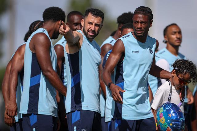 Cape Verde's defender #04 Pico Lopes and midfielder #21 Nuno da Costa take part in a training session during the 2026 World Cup tournament at Waters Sportsplex in Tampa, Florida on June 18, 2026. (Photo by PATRICIA DE MELO MOREIRA / AFP)