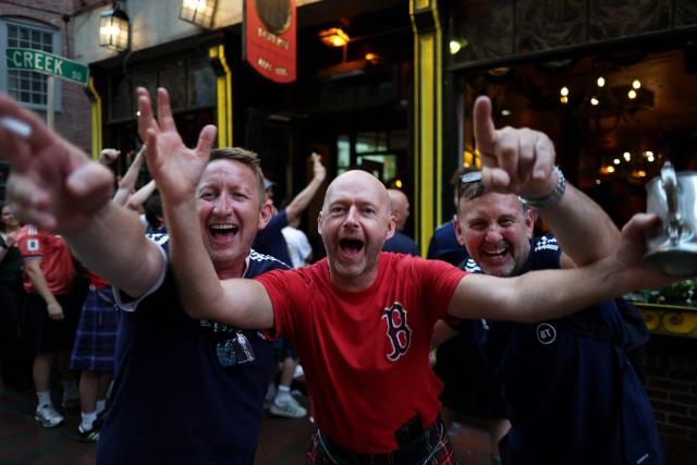 Scottish fans react as they gather on the eve of the 2026 World Cup Group C football match between Morocco and Scotland in Boston on June 18, 2026. (Photo by FRANCK FIFE / AFP)