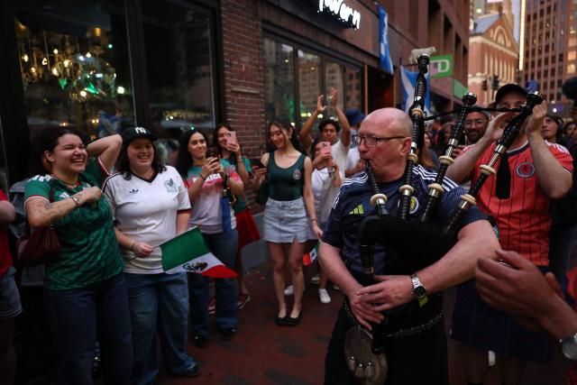 Scottish fans react as they gather on the eve of the 2026 World Cup Group C football match between Morocco and Scotland in Boston on June 18, 2026. (Photo by FRANCK FIFE / AFP)