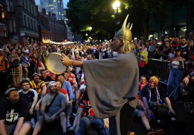 Scottish and Norwegian fans react as they gather on the eve of the 2026 World Cup Group C football match between Morocco and Scotland in Boston on June 18, 2026. (Photo by FRANCK FIFE / AFP)