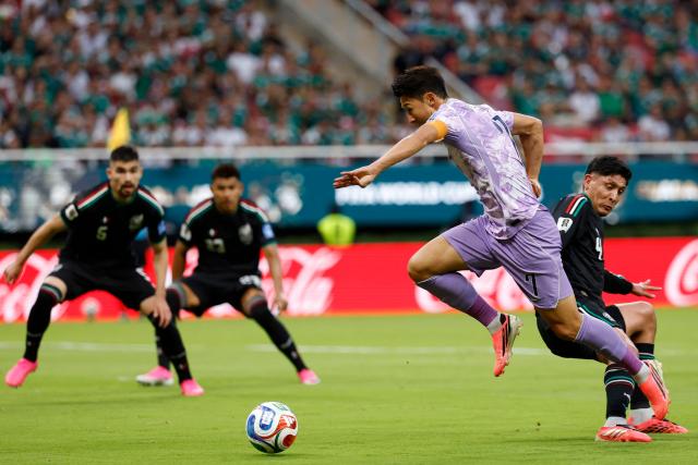 South Korea's forward #07 Son Heung-min and Mexico's midfielder #04 Edson Alvarez fight for the ball during the 2026 World Cup Group A football match between Mexico and South Korea at the Guadalajara Stadium in Zapopan on June 18, 2026.  (Photo by Ulises RUIZ / AFP)