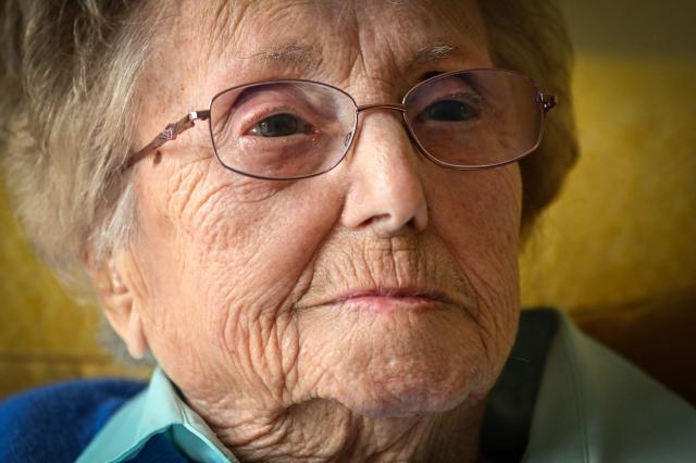 This photo taken on June 4, 2026 shows 97-year-old Carmen Cid during an interview with AFP at her home in Carlisle, northern England. Carmen Cid lived in Bilbao in northern Spain, and was eight years old when she boarded the ship SS Habana in Santurce, a town about 10 kms from her home, to Southampton, southern England. Travelling with her were her siblings, who were 10 and 11 at the time. (Photo by Andy BUCHANAN / AFP) / TO GO WITH Spain-UK-war-refugees,REPORT by Pablo SAN ROMAN