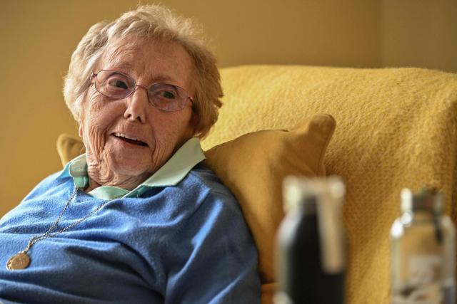 This photo taken on June 4, 2026 shows 97-year-old Carmen Cid during an interview with AFP at her home in Carlisle, northern England. Carmen Cid lived in Bilbao in northern Spain, and was eight years old when she boarded the ship SS Habana in Santurce, a town about 10 kms from her home, to Southampton, southern England. Travelling with her were her siblings, who were 10 and 11 at the time. (Photo by Andy BUCHANAN / AFP) / TO GO WITH Spain-UK-war-refugees,REPORT by Pablo SAN ROMAN