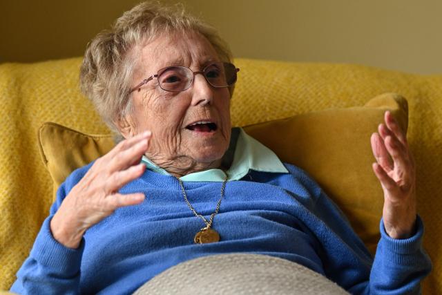 This photo taken on June 4, 2026 shows 97-year-old Carmen Cid during an interview with AFP at her home in Carlisle, northern England. Carmen Cid lived in Bilbao in northern Spain, and was eight years old when she boarded the ship SS Habana in Santurce, a town about 10 kms from her home, to Southampton, southern England. Travelling with her were her siblings, who were 10 and 11 at the time. (Photo by Andy BUCHANAN / AFP) / TO GO WITH Spain-UK-war-refugees,REPORT by Pablo SAN ROMAN
